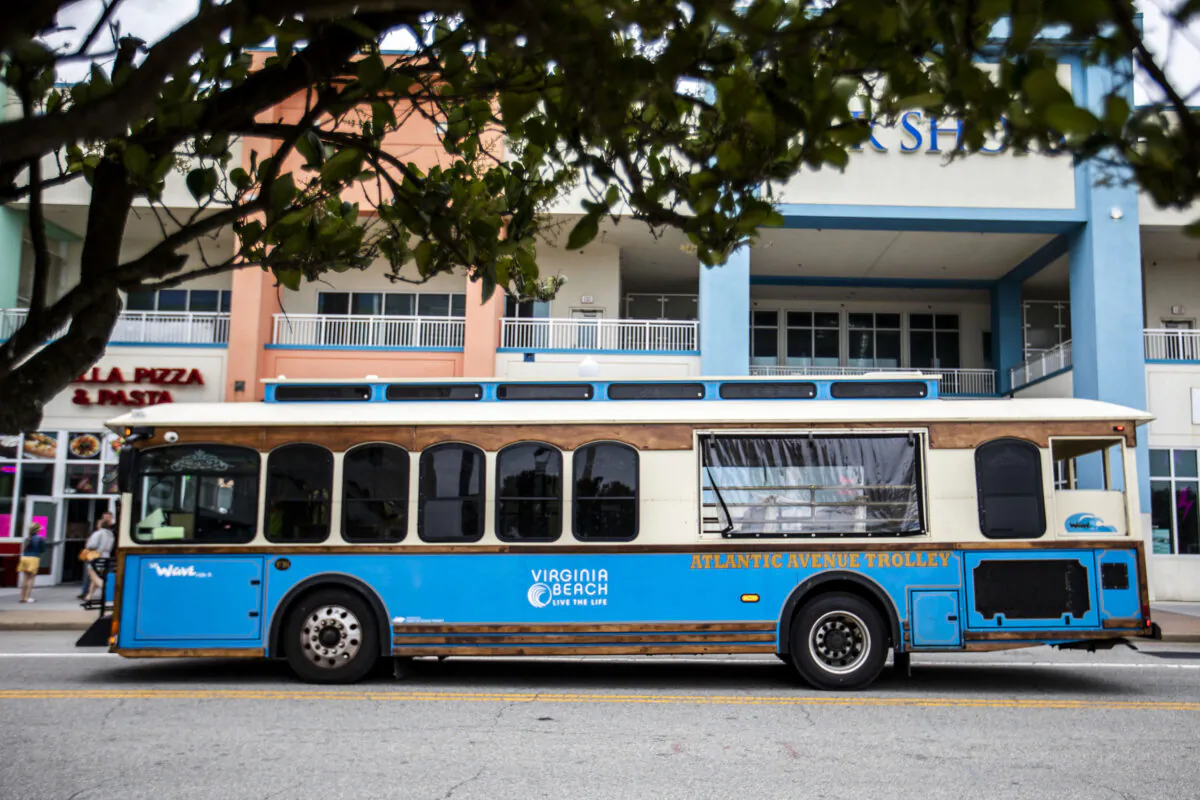 A trolley travels along Atlantic Avenue at the Oceanfront on May 26, 2023, in Virginia Beach, Virginia. (Kendall Warner/The Virginian-Pilot/TNS)