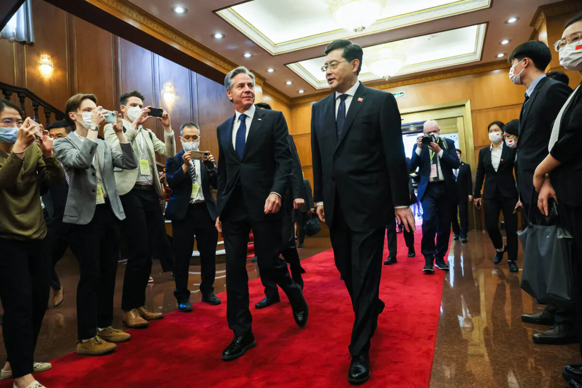 U.S. Secretary of State Antony Blinken (L) walks with China's foreign minister Qin Gang ahead of a meeting at the Diaoyutai State Guesthouse in Beijing on June 18, 2023. (Leah Millis/Pool/AFP via Getty Images)