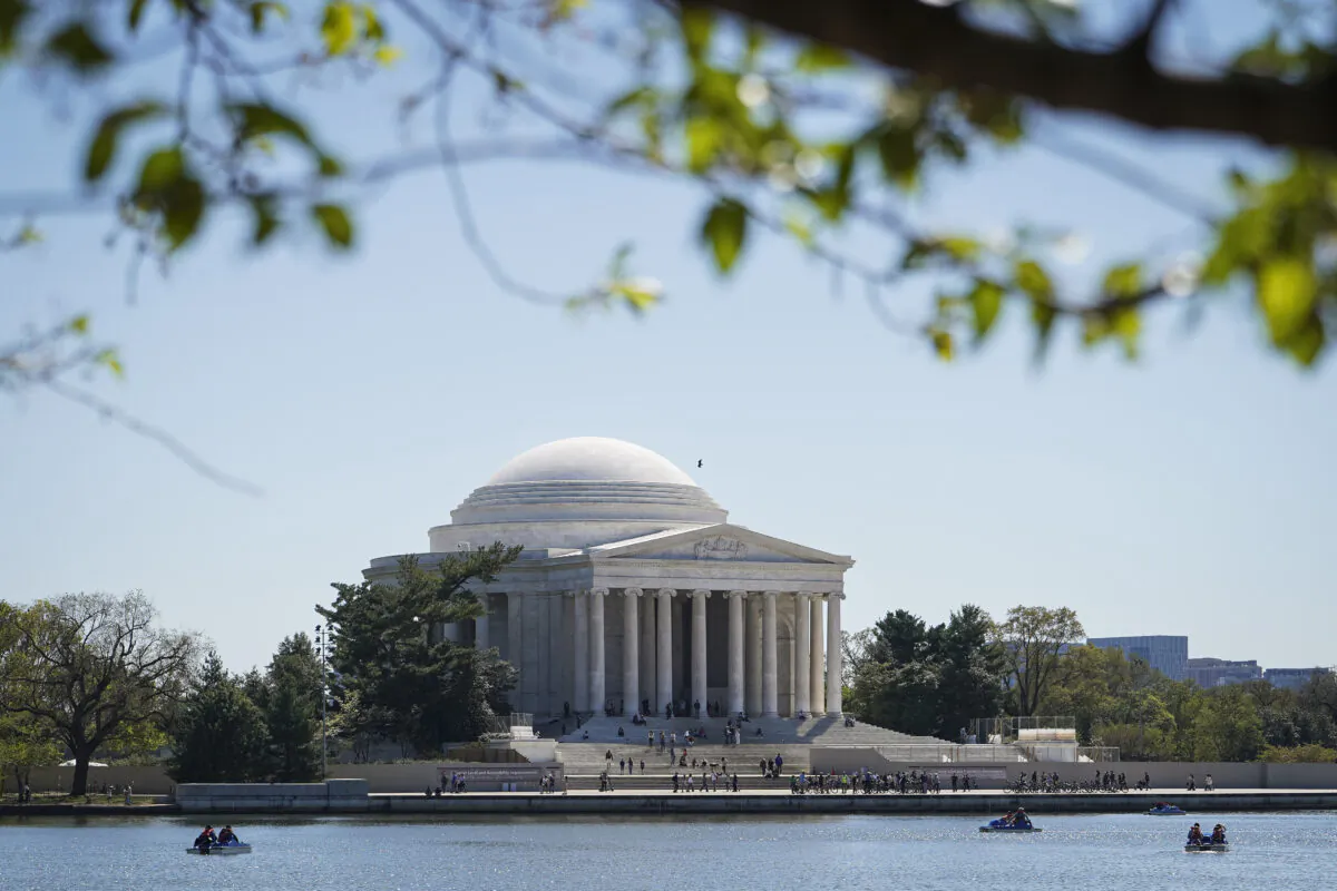Jefferson Memorial across the Tidal Basin in Washington on April 10, 2023. (Madalina Vasiliu/The Epoch Times)