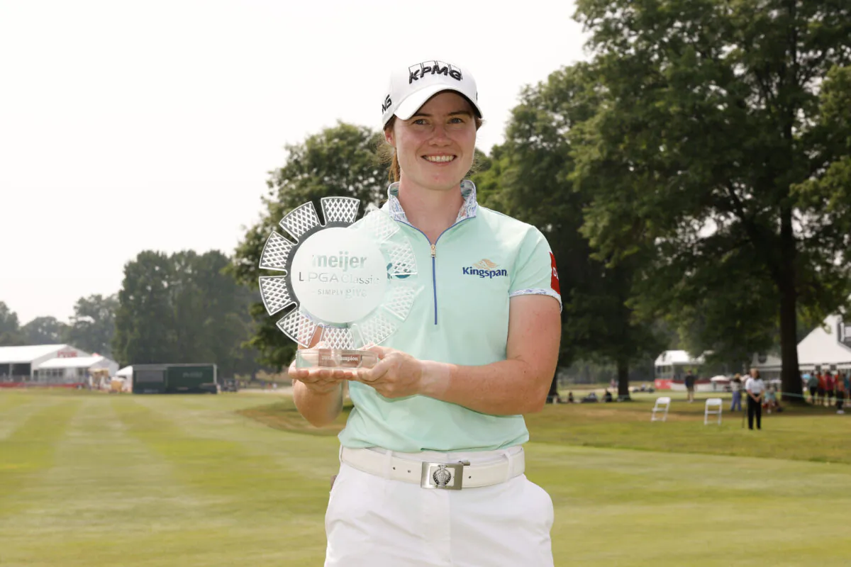 Leona Maguire of Ireland poses for a photo with the trophy after winning the Meijer LPGA Classic for Simply Give at Blythefield Country Club in Grand Rapids, Mich., on June 18, 2023. (David Berding/Getty Images)