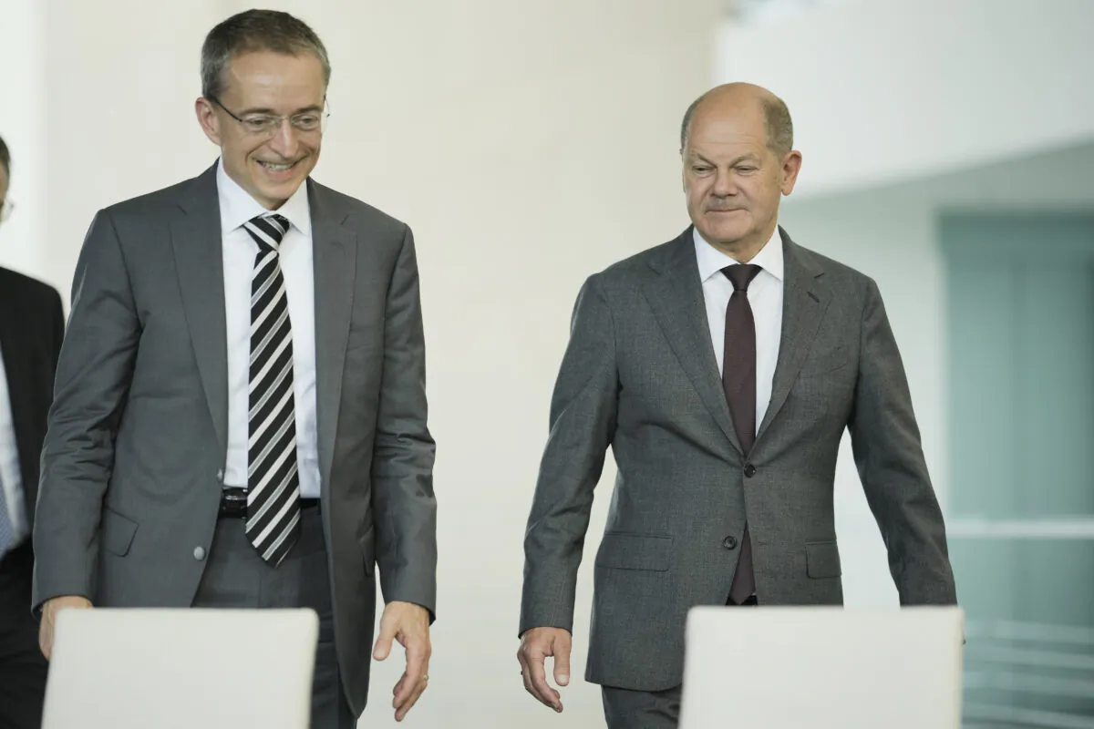 German Chancellor Olaf Scholz (R) and Intel CEO Pat Gelsinger attend the signing ceremony of an agreement between the German government and the company at the Chancellery in Berlin on June 19, 2023. (Markus Schreiber/AP Photo)