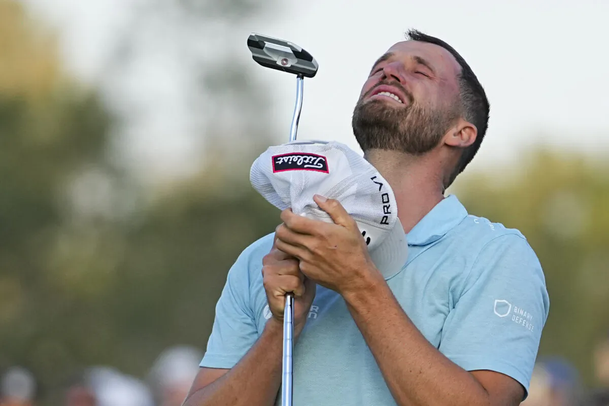 Wyndham Clark celebrates on the 18th hole after winning the U.S. Open golf tournament at Los Angeles Country Club in Los Angeles on June 18, 2023. (Matt York/AP Photo)