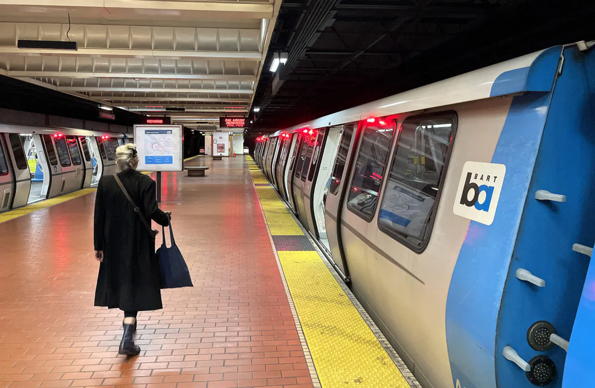 A Bay Area Rapid Transit (BART) passenger walks on an empty platform at the North Berkeley station in Berkeley, Calif., on March 15, 2023. (Justin Sullivan/Getty Images)