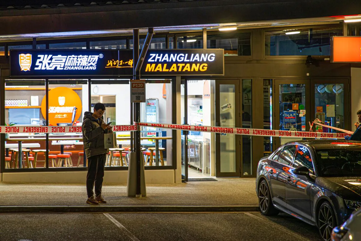 Police tape cordons off a restaurant in Auckland, New Zealand, on June 20, 2023, after an axe attack late Monday. (Hayden Woodward/New Zealand Herald via AP)