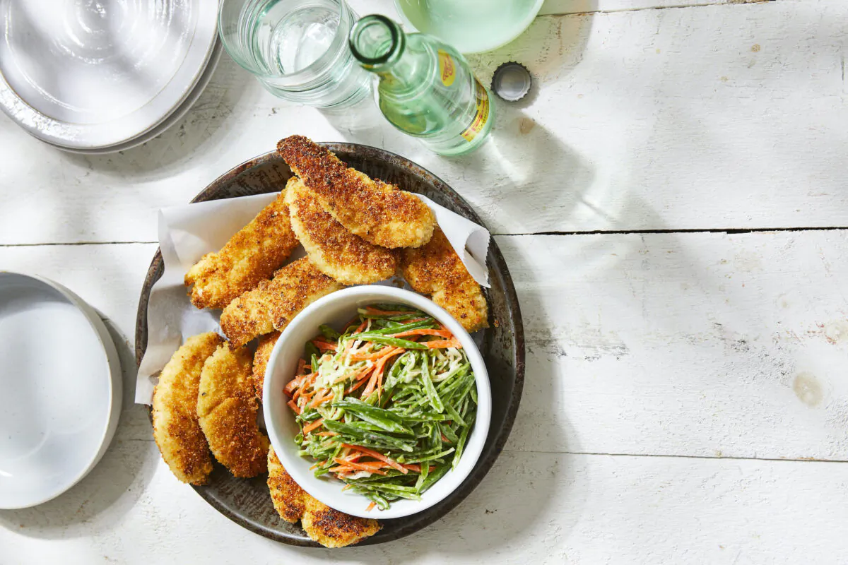 The fresh crunchy slaw helps balance the richness of the chicken. (Jason Donnelly/TNS)