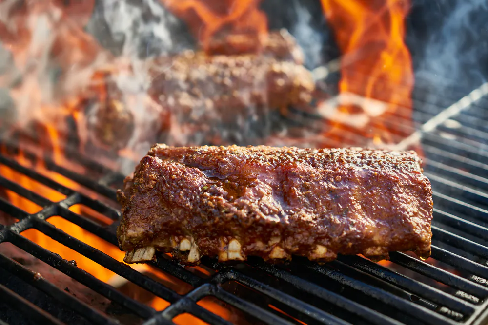 Never skimp on the sugar and salt when it comes to making crispy, succulent ribs. (Joshua Resnick/Shutterstock)