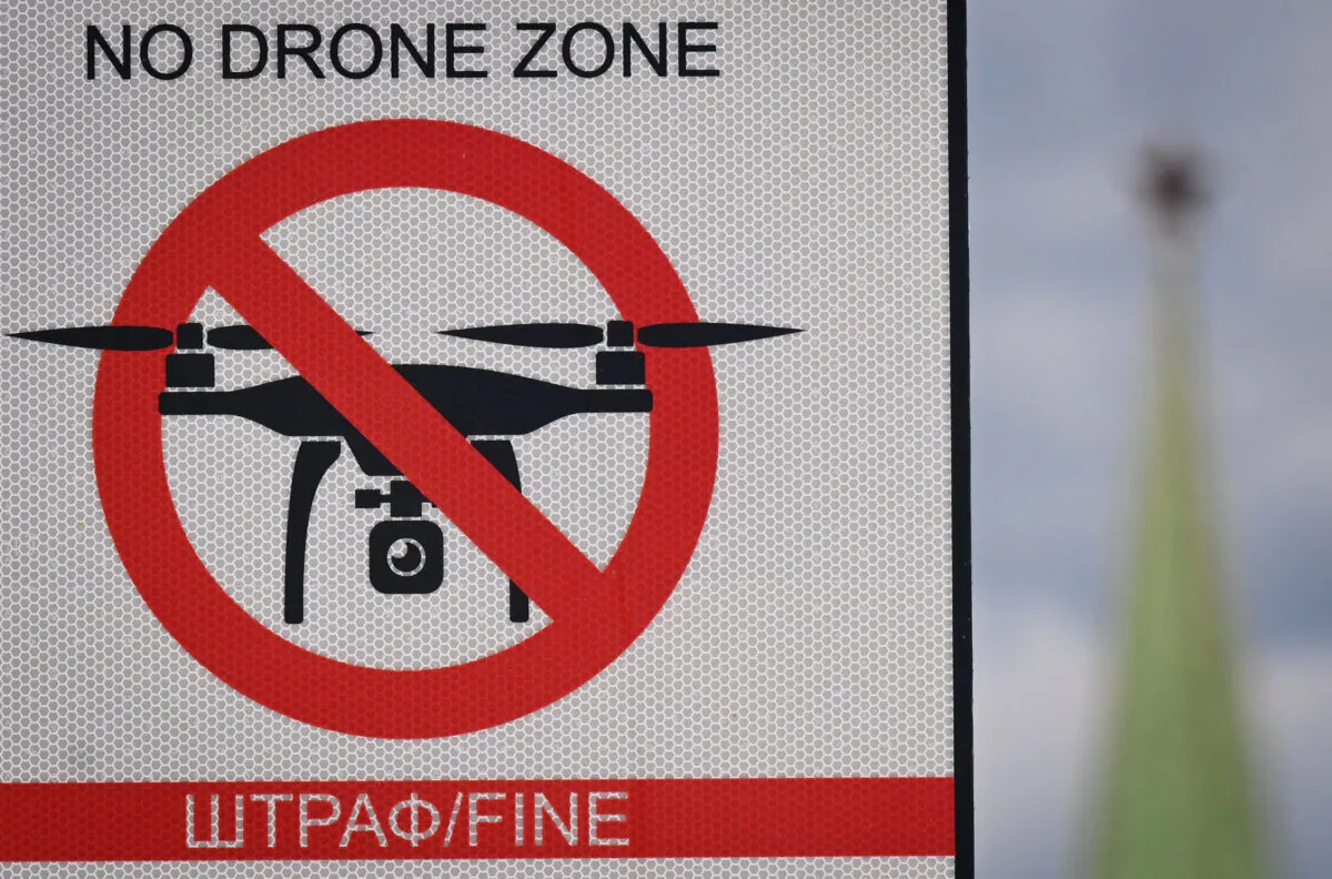 A "No Drone Zone" sign prohibiting unmanned aerial vehicles (drones) flying over the area is seen in central Moscow on June 21, 2023. (Natalia Kolesnikova/AFP via Getty Images)