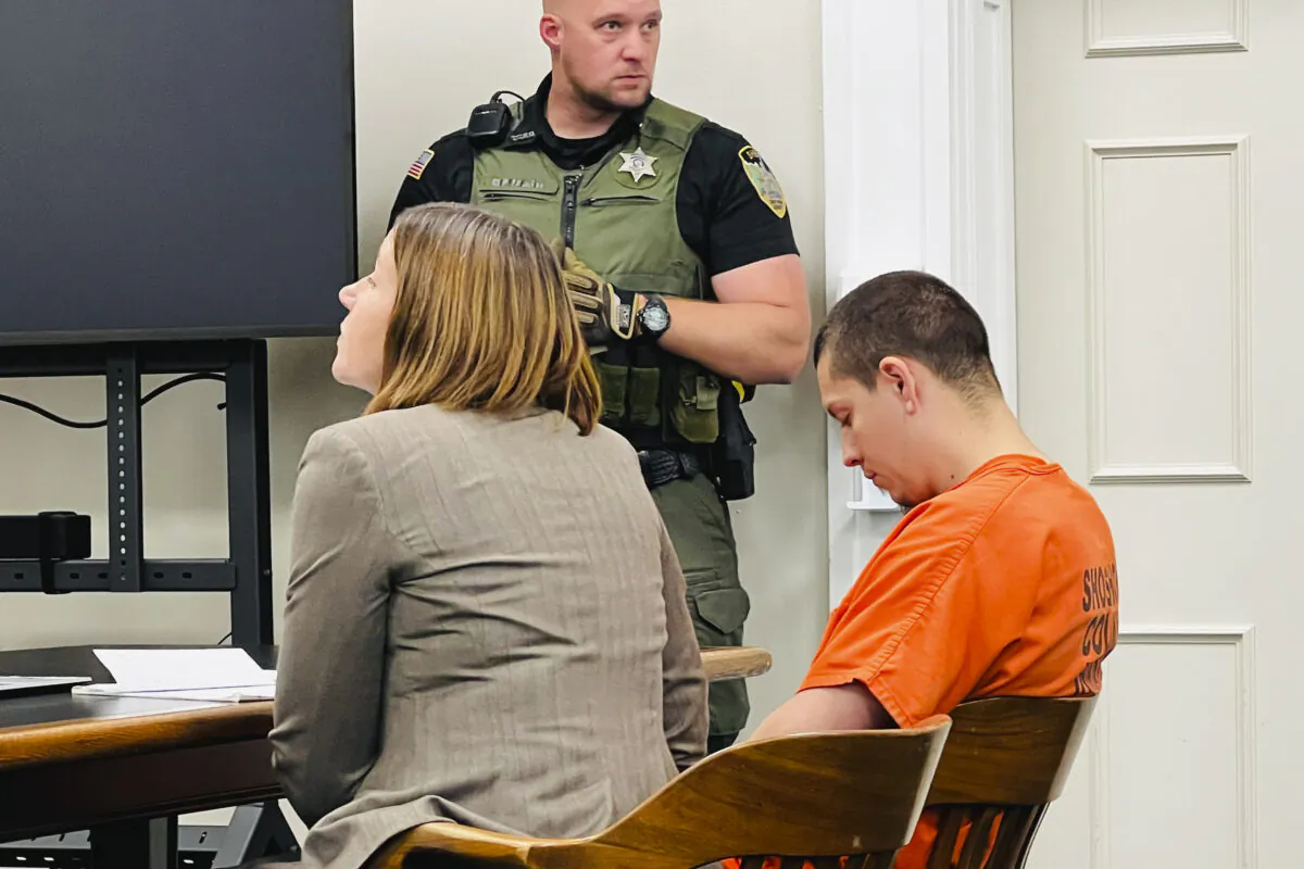 Majorjon Kaylor (R) sits next to defense attorney Lisa Chesebro in a courtoom in Wallace, Idaho, on June 20, 2023. (Josh McDonald/Shoshone News-Press via AP)