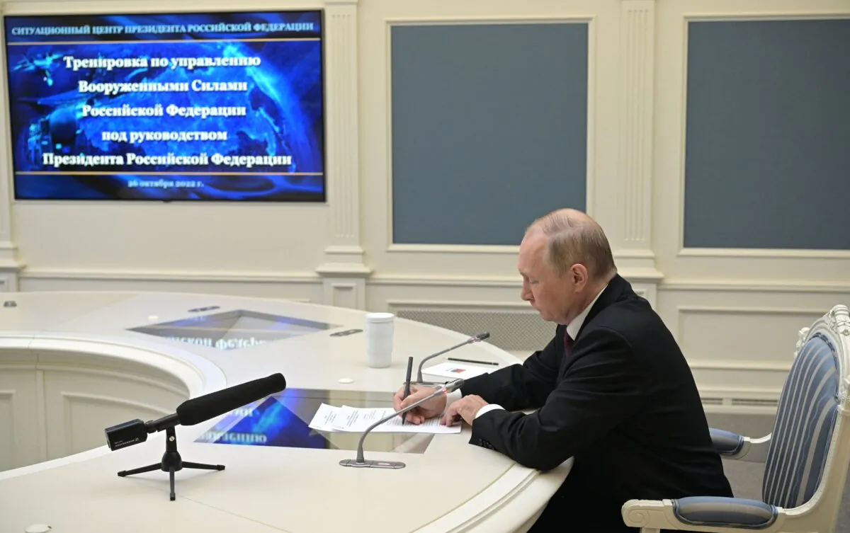 Russian President Vladimir Putin oversees the training of the strategic deterrence forces, troops responsible for responding to threats of nuclear war, via a video link in Moscow on Oct. 26, 2022. (Alexei Babushkin/SPUTNIK/AFP via Getty Images)