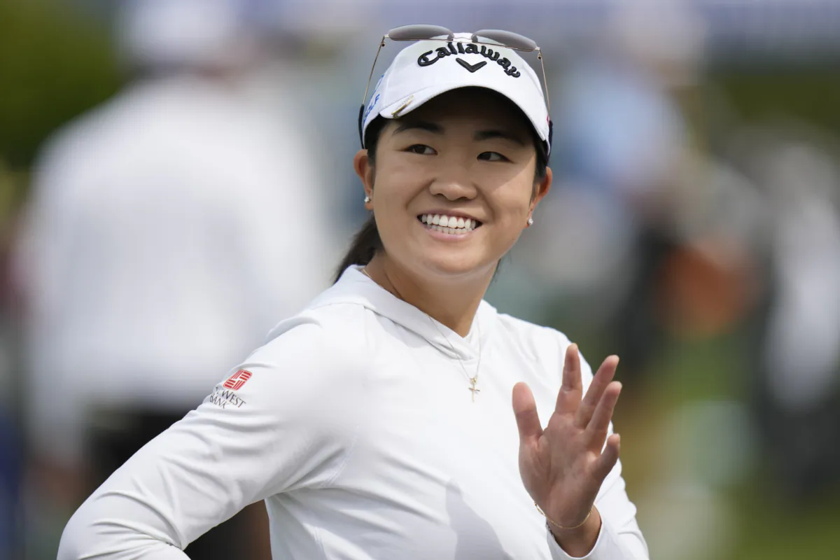 Rose Zhang, of Irvine, Calif., waves on the driving range ahead of the Women's PGA Championship golf tournament, in Springfield, N.J., on June 21, 2023. (AP Photo/Seth Wenig)