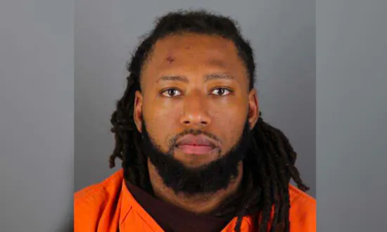 Suspect in Deadly Minneapolis Crash Charged With Homicide, Federal Weapons and Drug Counts
