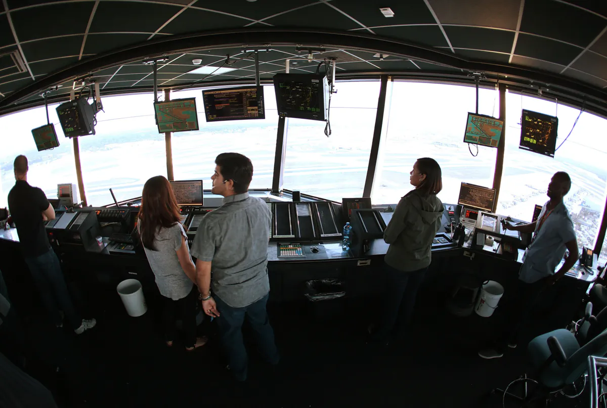 Air traffic controllers keep watch using Data Comm, part of the FAA's Next Generation Air Transportation system in the control tower at Miami International Airport in Miami, Fla., on March 6, 2017. (Joe Raedle/Getty Images)