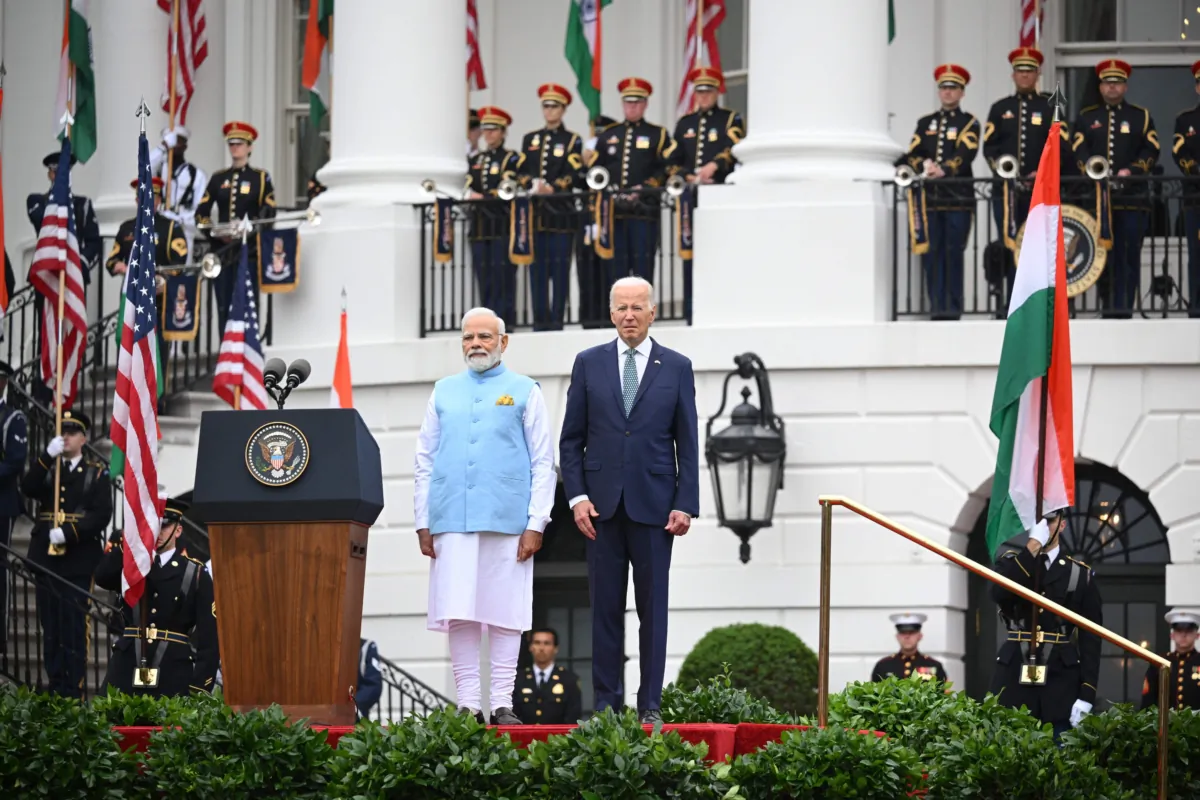 U.S. President Joe Biden and Indian Prime Minister Narendra Modi (L) listen to the national anthems during a welcoming ceremony for Modi in the South Lawn of the White House on June 22, 2023. (Mandel Ngan/AFP via Getty Images)