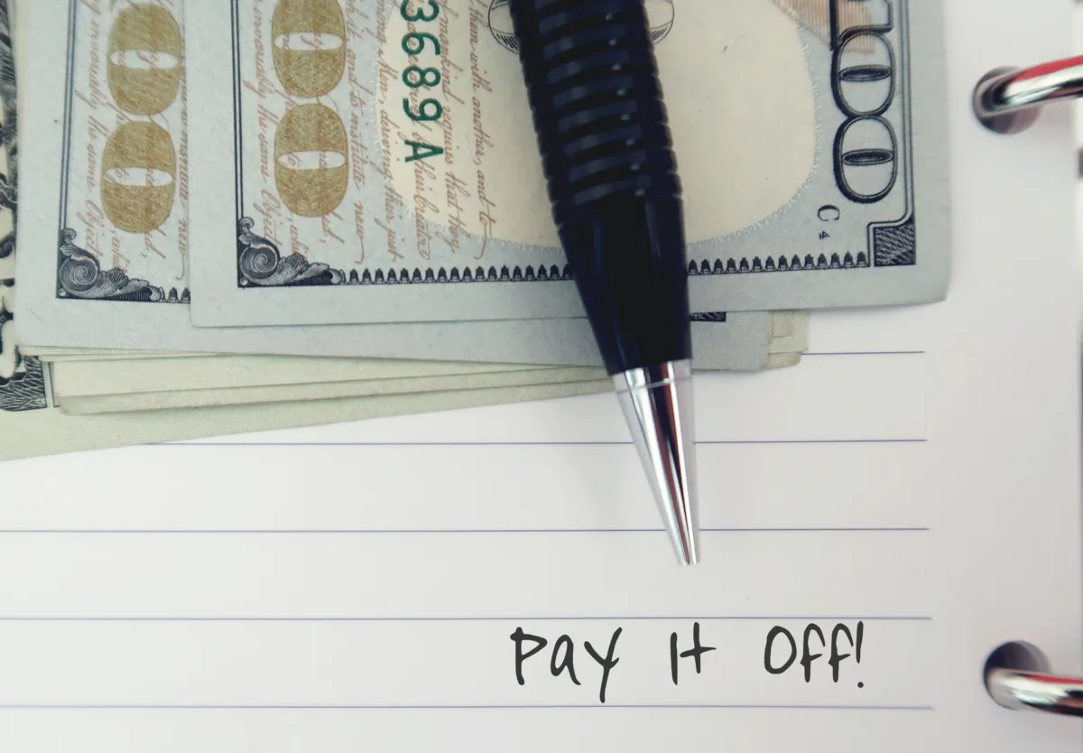 Mary Hunt advises college grads to focus on paying back their student debts first, and breaks down why.(Ariya J/Shutterstock)