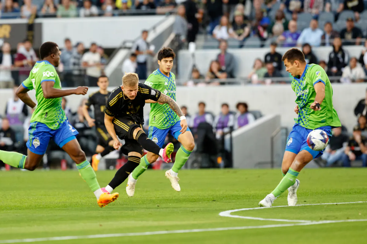 Mateusz Bogusz (19) of Los Angeles FC scores in the opening minute from outside of the box in a match versus the Seattle Sounders  at BMO Stadium in Los Angeles, on Jun 21, 2023. (Courtesy of LAFC via The Epoch Times)
