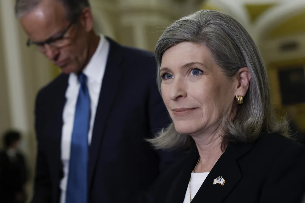 Sen. Joni Ernst (R-Iowa), (R) stands beside Sen. John Thune (R-S.D.) at a June 2023 press conference in Washington. (Anna Moneymaker/Getty Images)