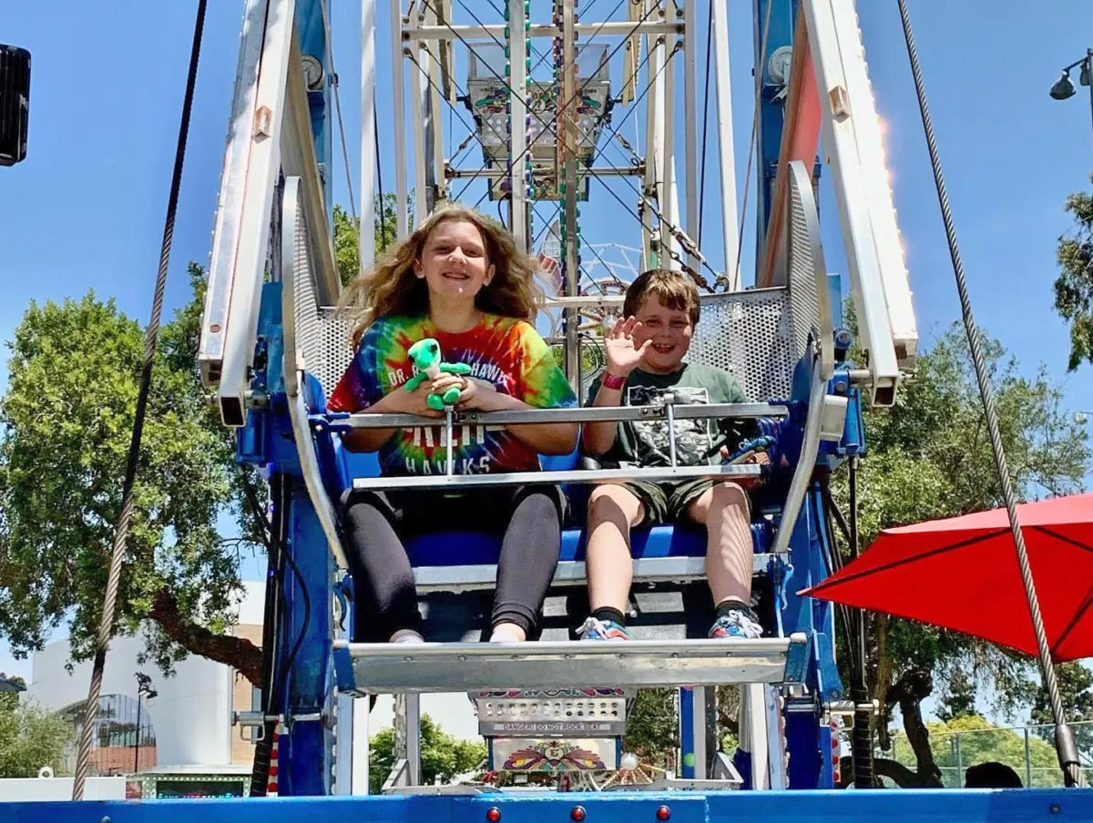 Children enjoy a ride at the Lions Fish Fry and Carnival in Costa Mesa, Calif. (Courtesy of the Lions Club)