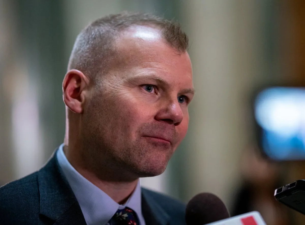Saskatchewan Education Minister Dustin Duncan speaks to the media after the budget is presented in Regina, on March 22, 2023. (Heywood Yu/The Canadian Press)