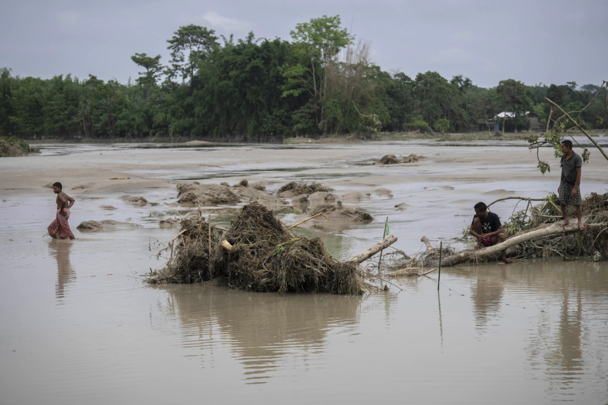 NextImg:Flooding Displaces Tens of Thousands and Kills One as Heavy Monsoon Rains Batter Indian Villages