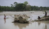Flooding Displaces Tens of Thousands and Kills One as Heavy Monsoon Rains Batter Indian Villages