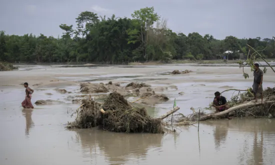 Flooding Displaces Tens of Thousands and Kills One as Heavy Monsoon Rains Batter Indian Villages