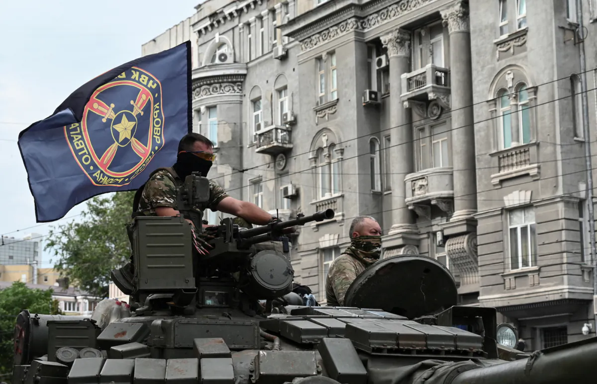 Fighters of Wagner, a Russian private mercenary group, are seen atop of a tank while being deployed near the headquarters of the Southern Military District in the city of Rostov-on-Don, Russia, on June 24, 2023. (Stringer/Reuters)