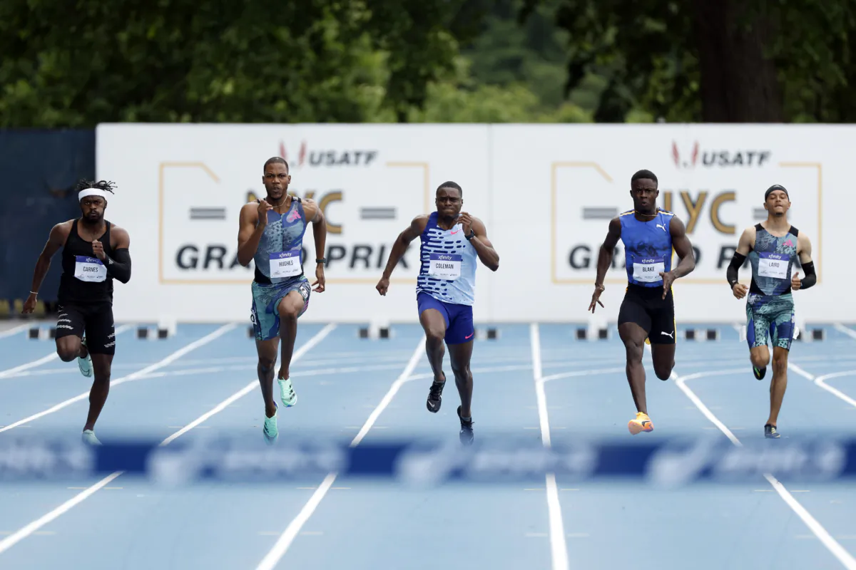 Brandon Carnes of the United States, Zharnel Hughes of Great Britain, Christian Coleman of the United States, Ackeem Blake of Jamaica, and Terrance Laird of the United States compete in the Asics Men's 100m during the 2023 USATF NYC Grand Prix at Icahn Stadium in New York on June 24, 2023. (Sarah Stier/Getty Images)