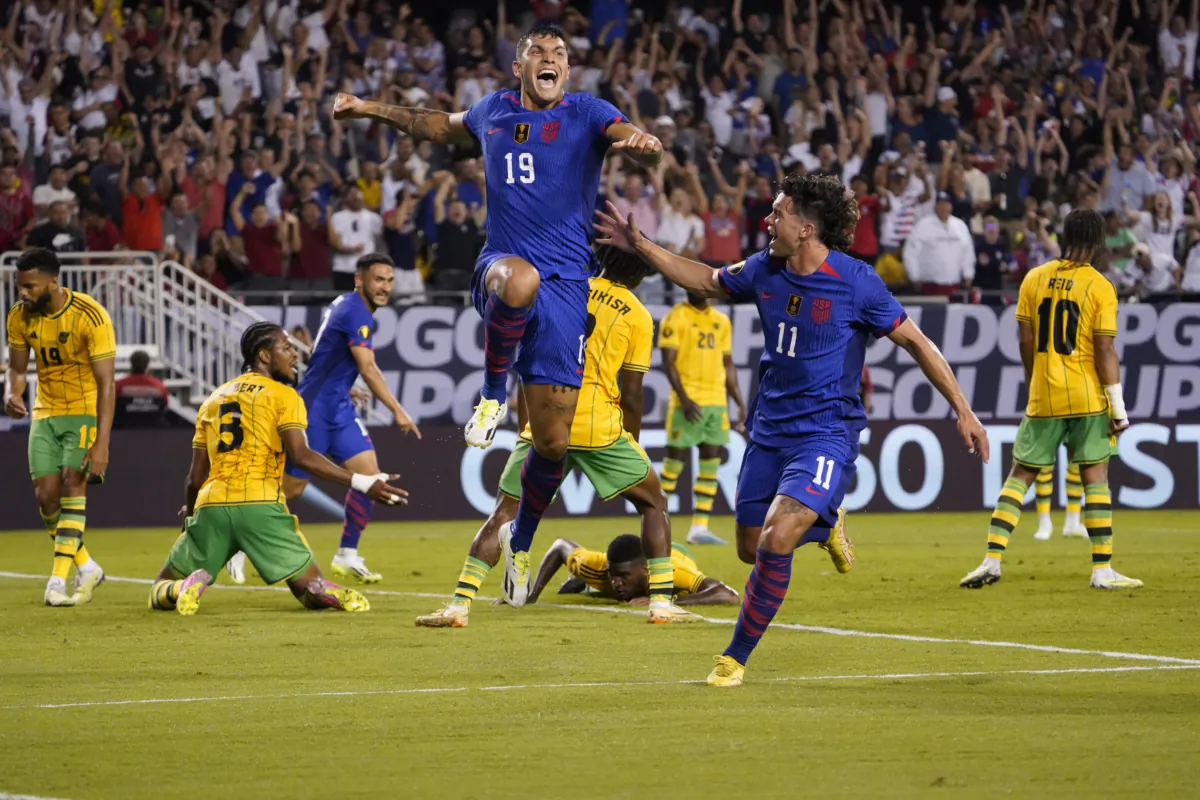 U.S.s forward Brandon Vazquez (19) celebrates his game-tying goal against Jamaica with forward Cade Cowell (11) late in the second half of a CONCACAF Gold Cup soccer match in Chicago on June 24, 2023. (David Banks/AP Photo)