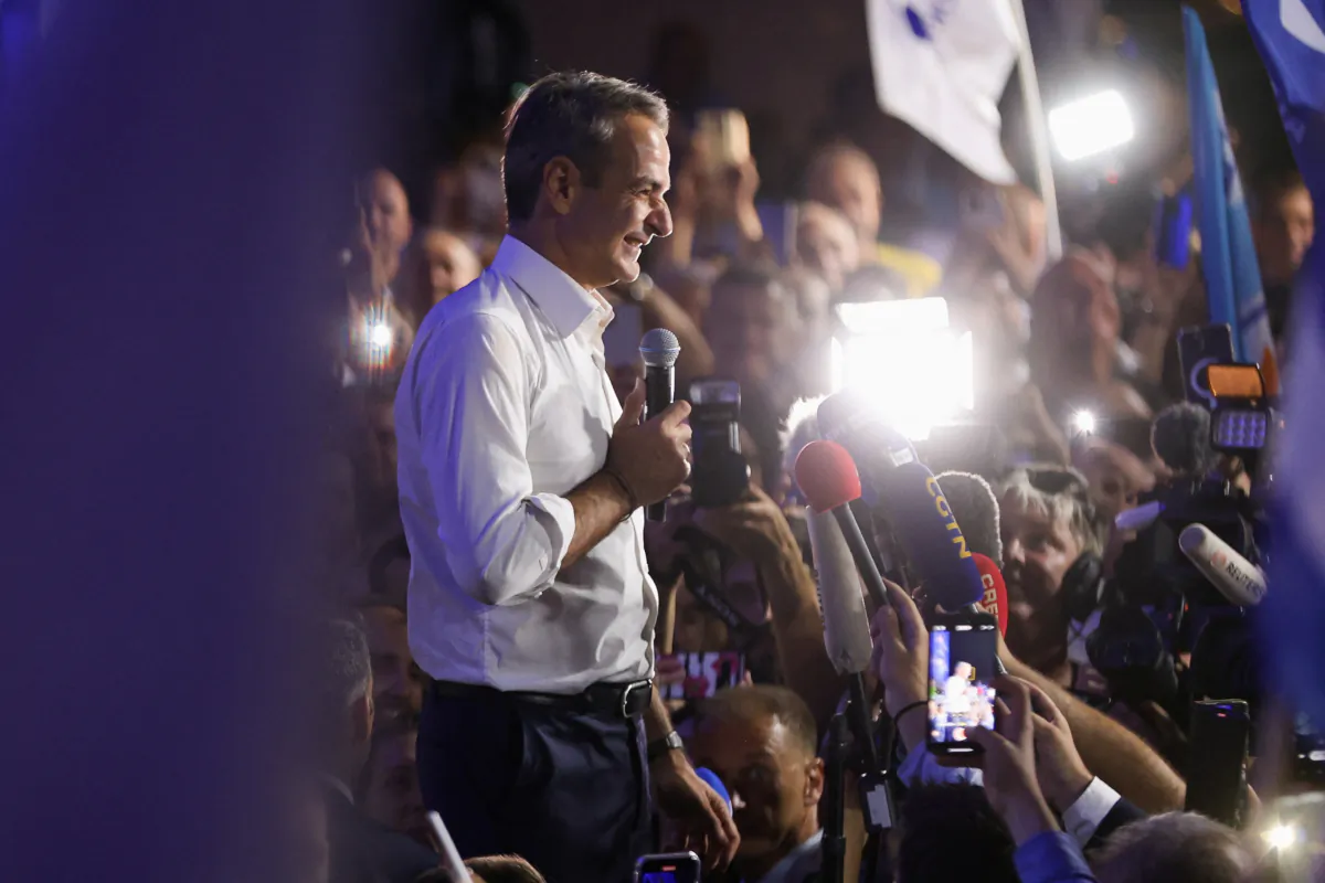 New Democracy conservative party leader Kyriakos Mitsotakis speaks to supporters outside the party's headquarters, after the general election, in Athens, Greece, on June 25, 2023. (Louiza Vradi/Reuters)