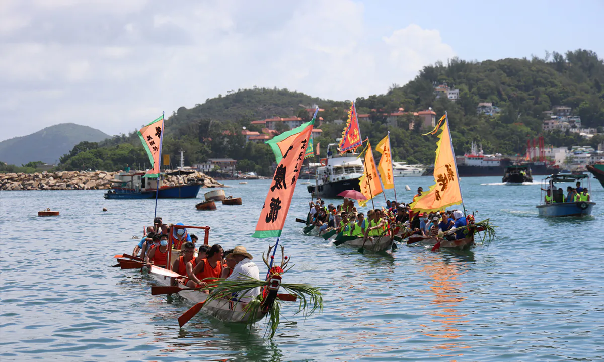 Villagers from Sai-Wan CARE Village of Cheung-Chau kept a 200+ years old tradition of holding the Dragon Parade on Dragon Boat Festival (Double Fifth Festival), a major cultural event of the locals. Photo taken in June 2021 off Cheung-Chau (Dumbbell Island), Hong Kong. （TM Chan/The Epoch Times）