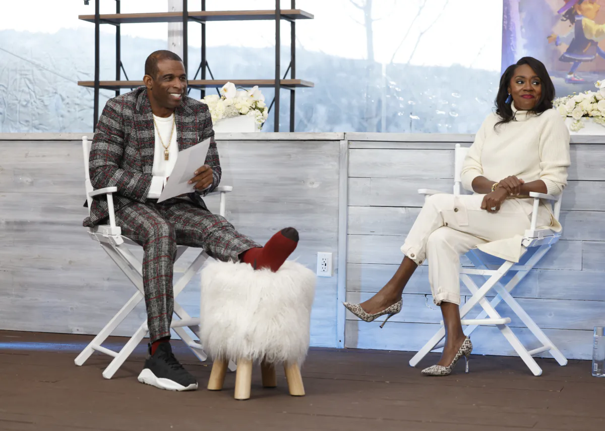 Deion Sanders (L) and Aflac’s Chief Brand and Marketing Officer, Shannon Watkins at Aflac’s “The Park Bench” Twitch Premiere event and panel at The St. Regis Deer Valley, in Park City, Utah, on January 22, 2022. (Fred Hayes/Getty Images for Aflac)