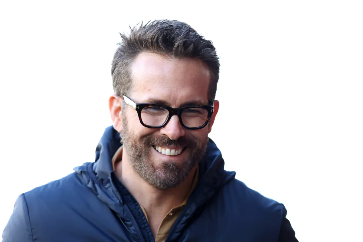 Ryan Reynolds smiles prior to the Vanarama National League match between Wrexham and Notts County at The Racecourse in Wrexham, Wales, on April 10, 2023. (Jan Kruger/Getty Images)