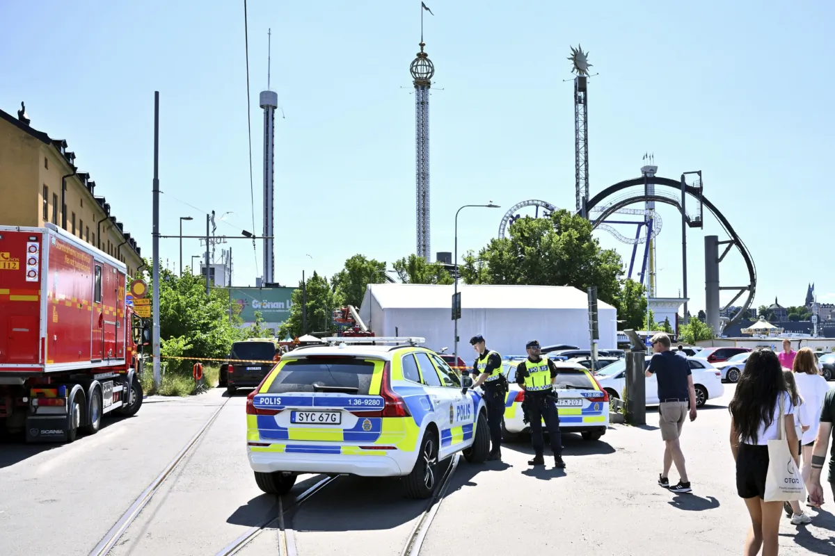 Police cordon off the Gröna Lund amusement park in Stockholm on June 25, 2023. (Claudio Bresciani/TT News Agency via AP)