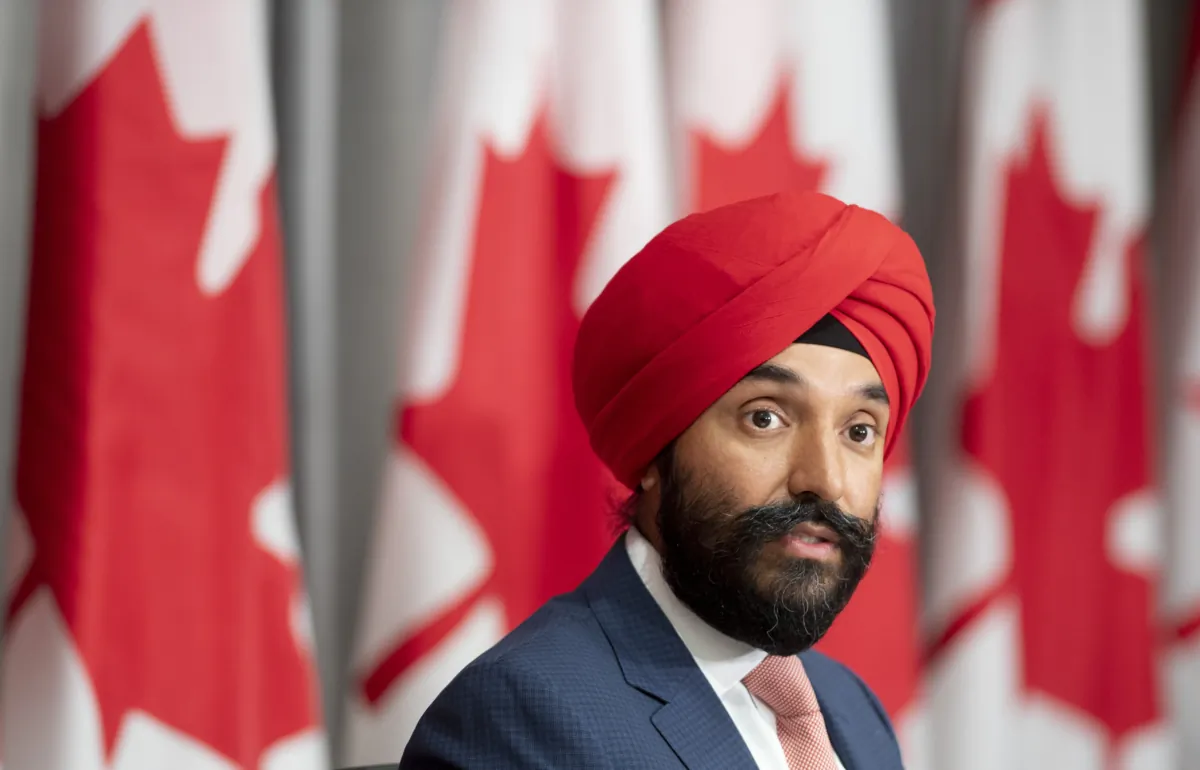 Innovation, Science and Industry Minister Navdeep Bains responds to a question during a news conference in Ottawa in this Aug. 25, 2020 file photo. (The Canadian Press/Adrian Wyld)