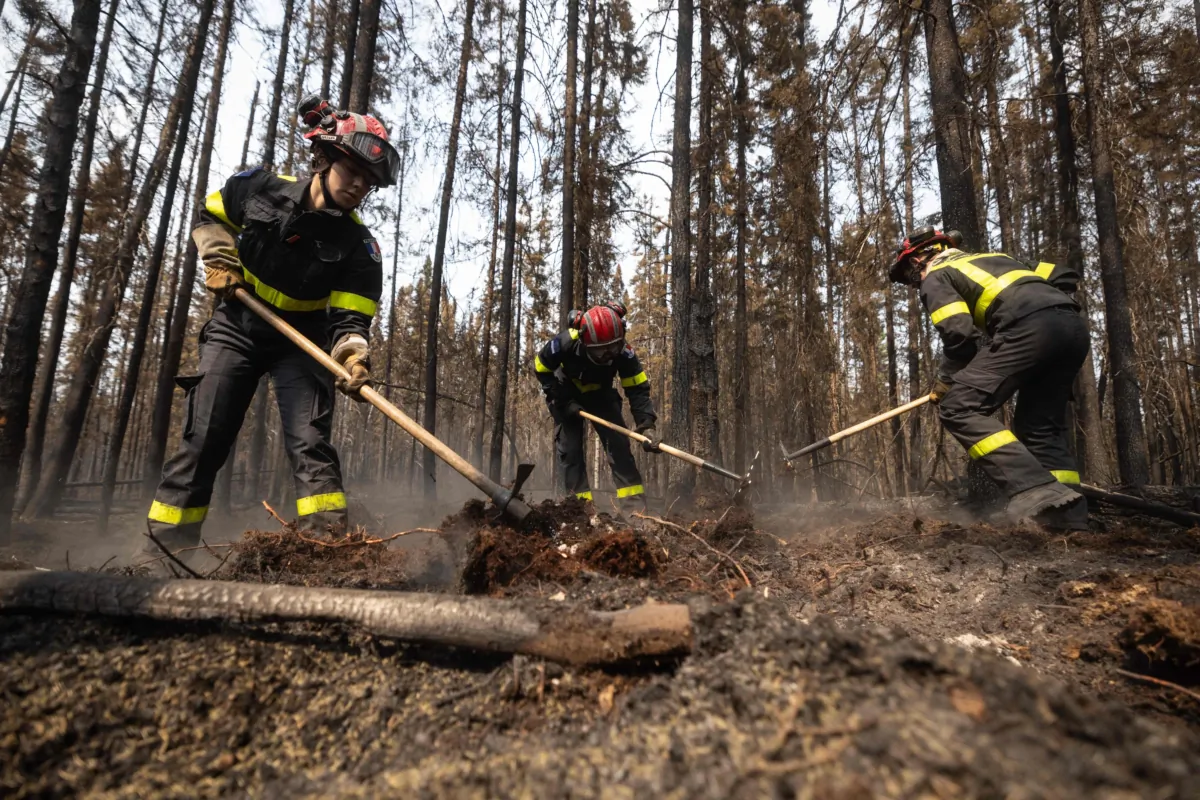French firefighters battle fires north from the city of Chibugamau, Quebec, in Canada on June 12, 2023. (Photo by Quentin TYBERGHIEN / AFP) (Photo by QUENTIN TYBERGHIEN/AFP via Getty Images)