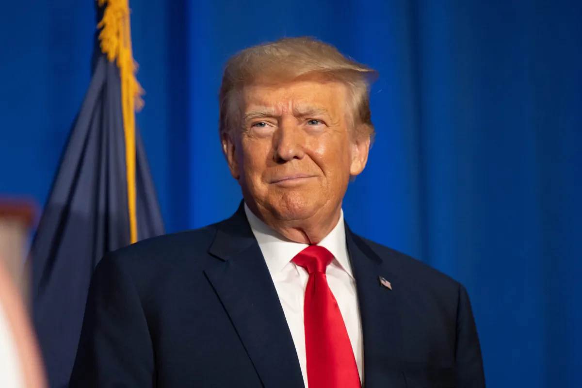 A Republican presidential candidate, former President Donald Trump stands on stage after being introduced during the New Hampshire Federation of Republican Women's Lilac Luncheon in Concord, N.H., on June 27, 2023. (Scott Eisen/Getty Images)