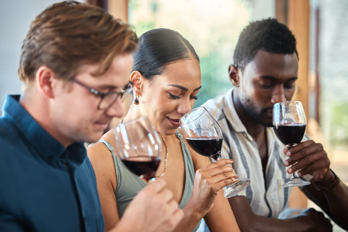 Help everyone have an enjoyable time by avoiding this tasting room faux pas. (PeopleImages.com - Yuri A/Shutterstock)