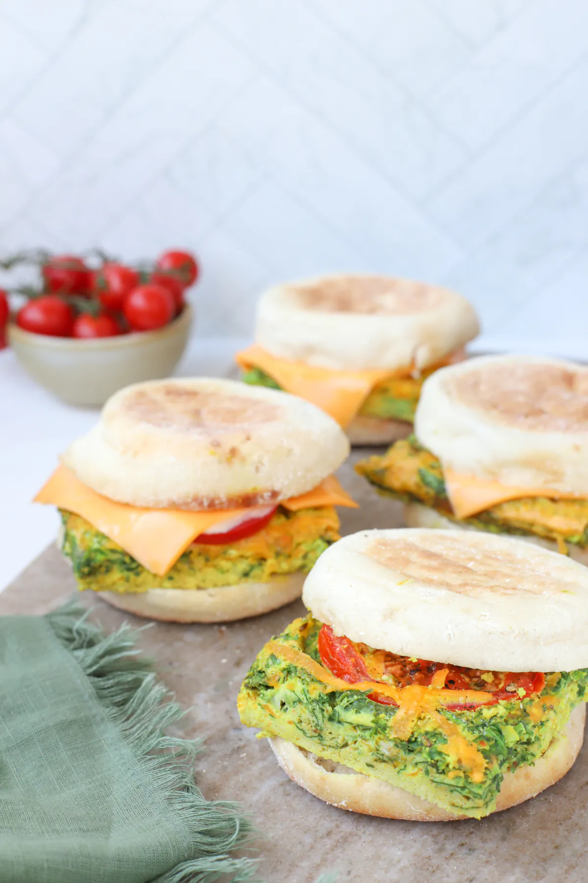 These sheet pan egg sandwiches are inspired by the beloved South Asian masala omelet. (Asha Loupy/TNS)
