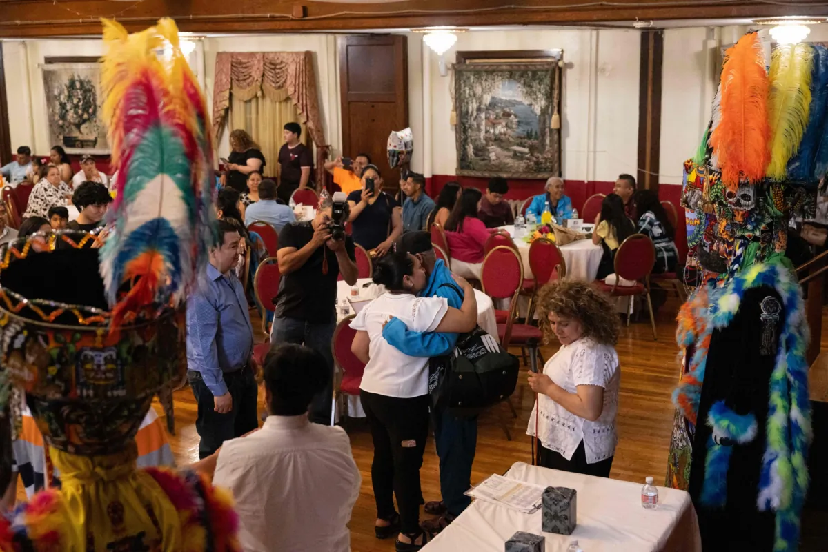 Illegal immigrants and their relatives take part in a family reunion event in Queens, New York, on June 25, 2023. (Yuki Iwamura/AFP via Getty Images)