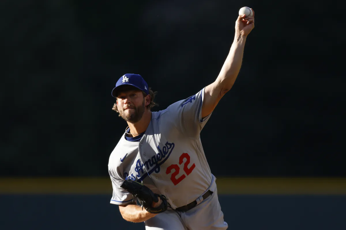 Starting pitcher Clayton Kershaw (22) of the Los Angeles Dodgers delivers to home plate in the first inning against the Colorado Rockies at Coors Field in Denver on June 27, 2023. (Justin Edmonds/Getty Images)