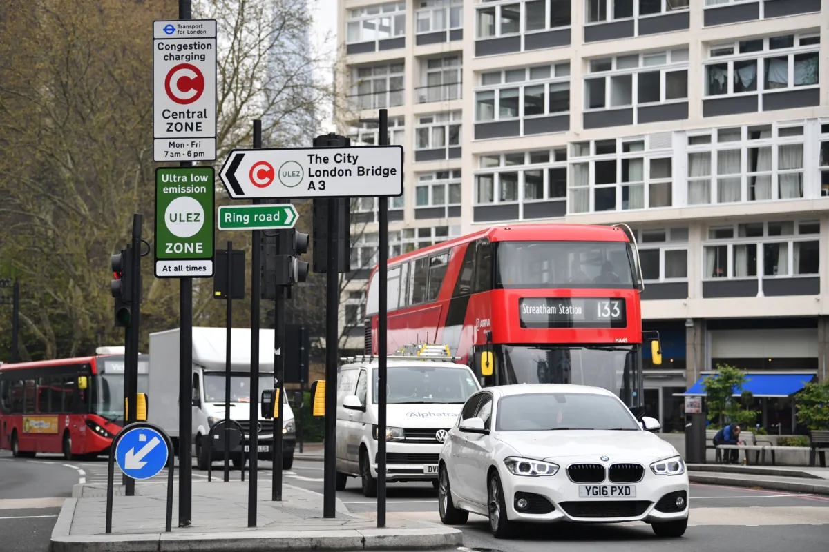 Signs for the ultra-low emission zone (ULEZ) are pictured in central London on April 8, 2019. (Ben Stansall/AFP via Getty Images)