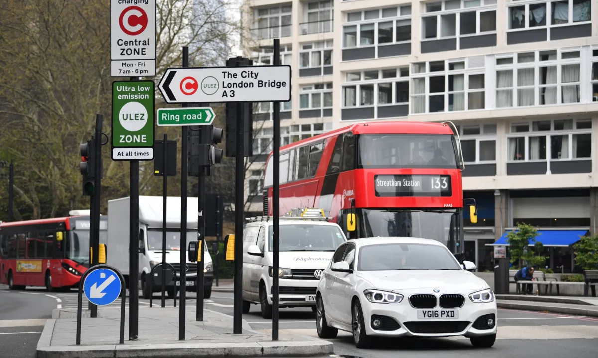 New signs for the ultra-low emission zone (ULEZ) are pictured in central London on April 8, 2019. (Ben Stansall/AFP via Getty Images)