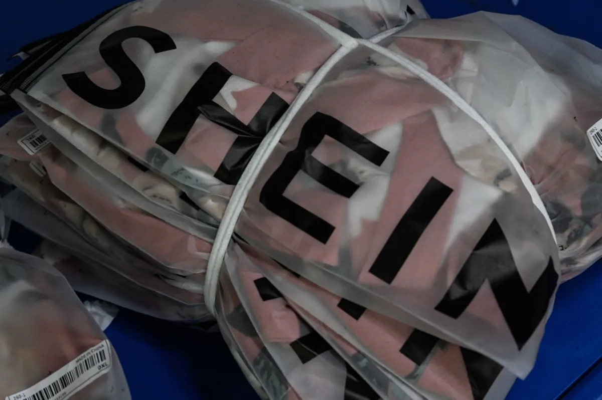 The signage of cross-border, fast-fashion, eCommerce company SHEIN at a garment factory in Guangzhou, in Chinas southern Guangdong province, on July 18, 2022. (Jade Gao/AFP via Getty Images)