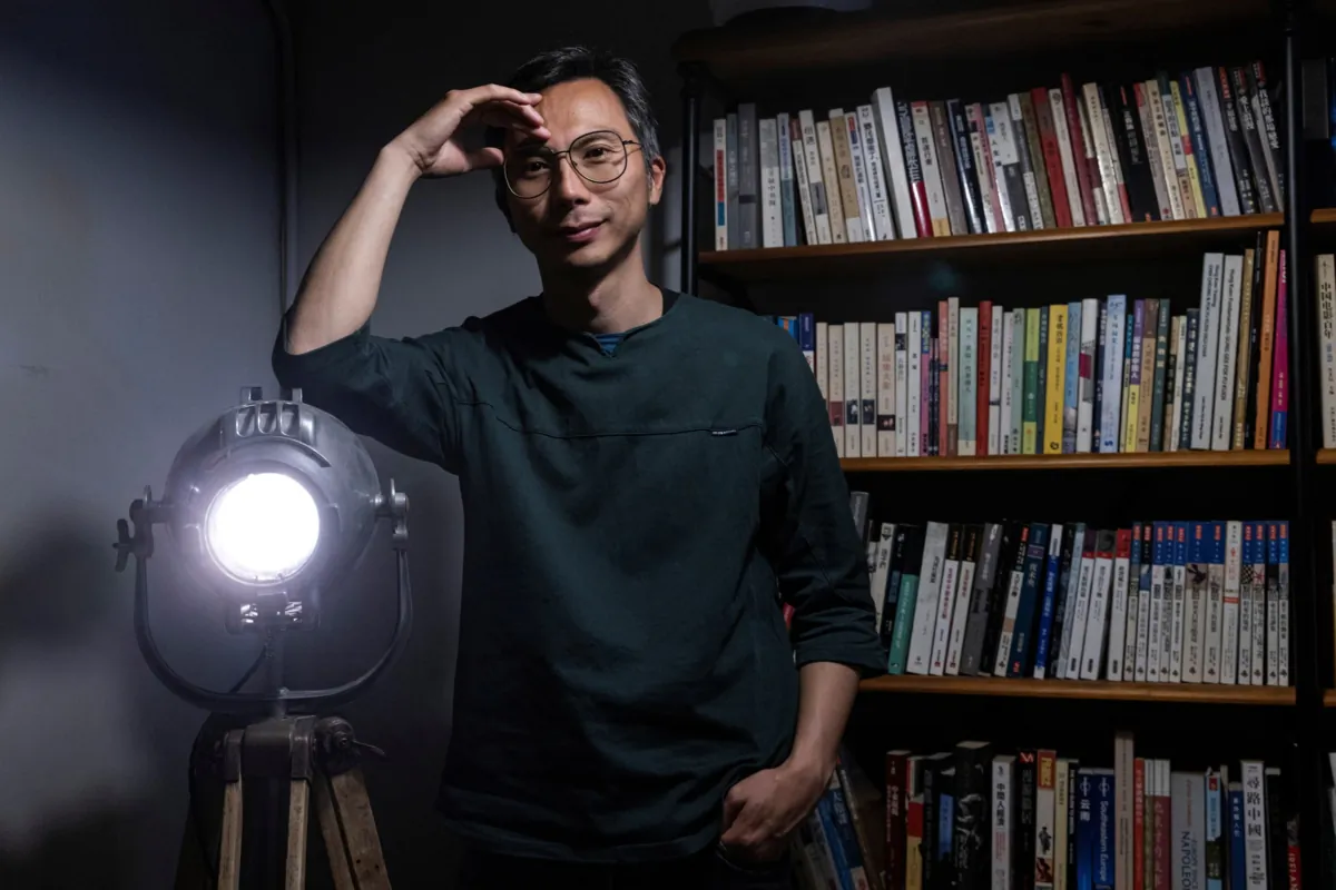 Director Kiwi Chow poses for photos after an interview in Hong Kong on May 11, 2023. (Tyrone Siu/Reuters)