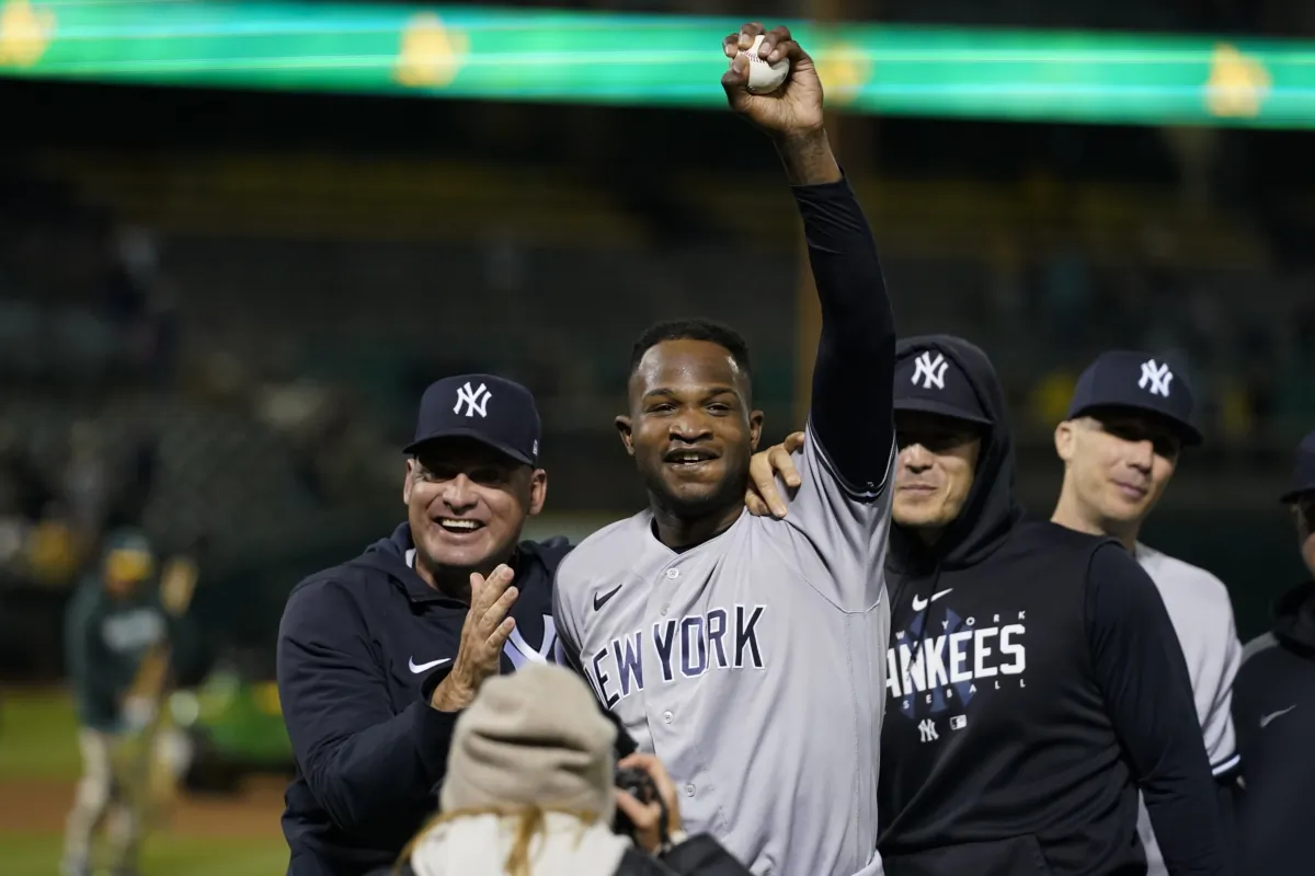 New York Yankees' Domingo Germán (C) celebrates after pitching a perfect game against the Oakland Athletics during a baseball game in Oakland, Calif., on June 28, 2023. (Godofredo A. Vásquez/AP Photo)