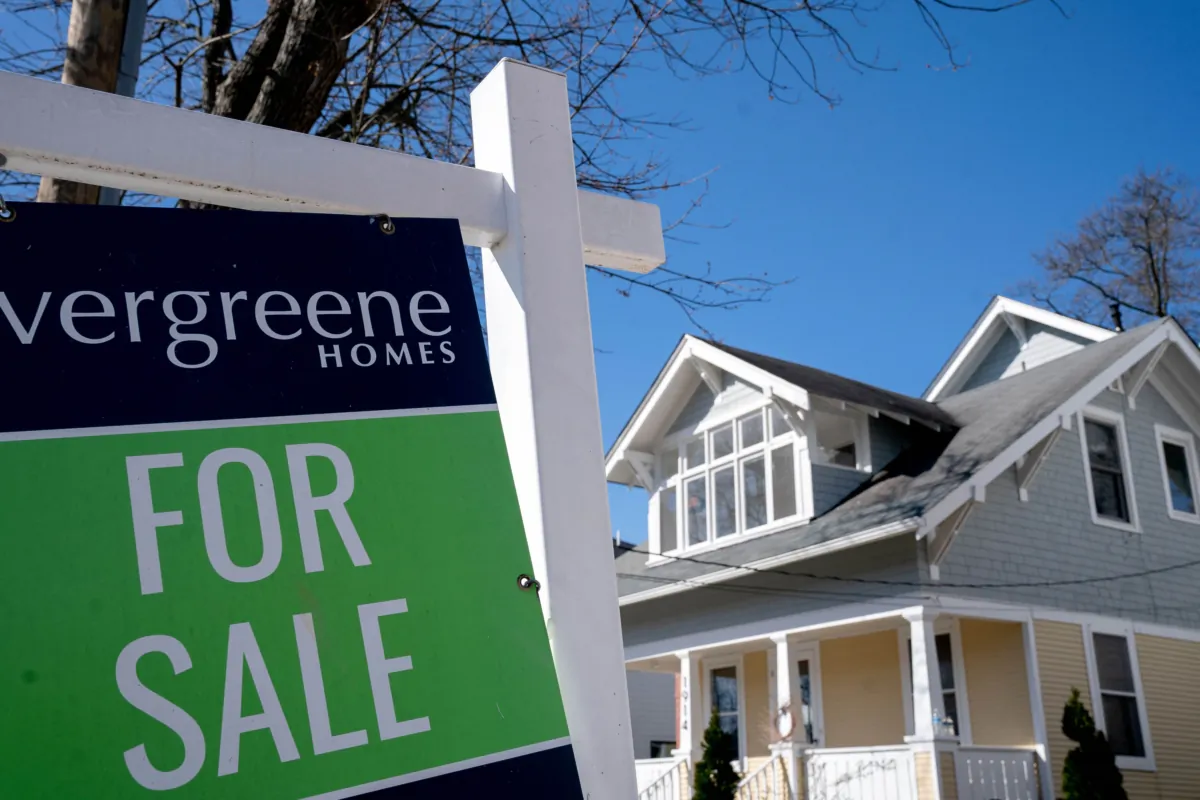 A "For Sale" sign is displayed in Falls Church, Va., on April 2, 2022. (Photo by Stefani Reynolds / /AFP via Getty Images)