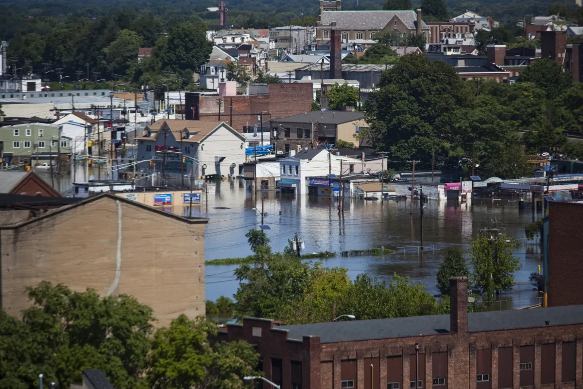 Flood waters from the Passaic River flow through the streets in Paterson, N.J., on Aug. 30, 2011. (Michael Nagle/Getty Images)