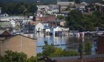 Helicopter Crew Rescues Firefighters Stranded When Rescue Boat Goes Over Falls