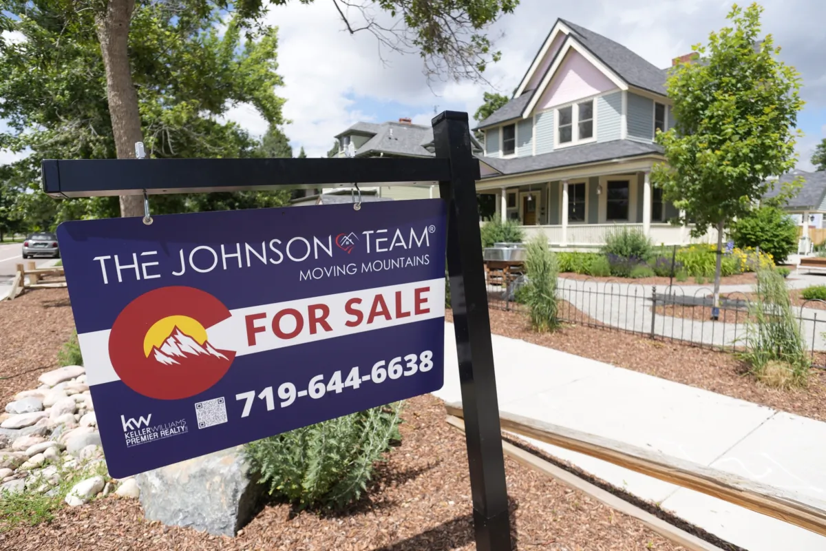 A sale sign stands outside a home on the market along Nevada Avenue in the Old North End neighborhood of Colorado Springs, Colo., on June 22, 2023. (David Zalubowski/AP Photo)