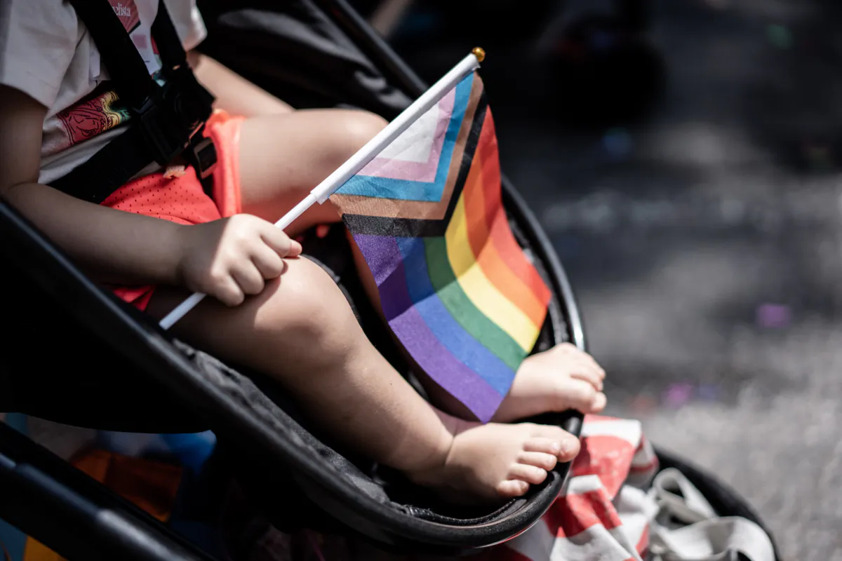 A toddler at the annual New York City Pride March in New York City on June 25, 2023. (Samira Bouaou/The Epoch Times)